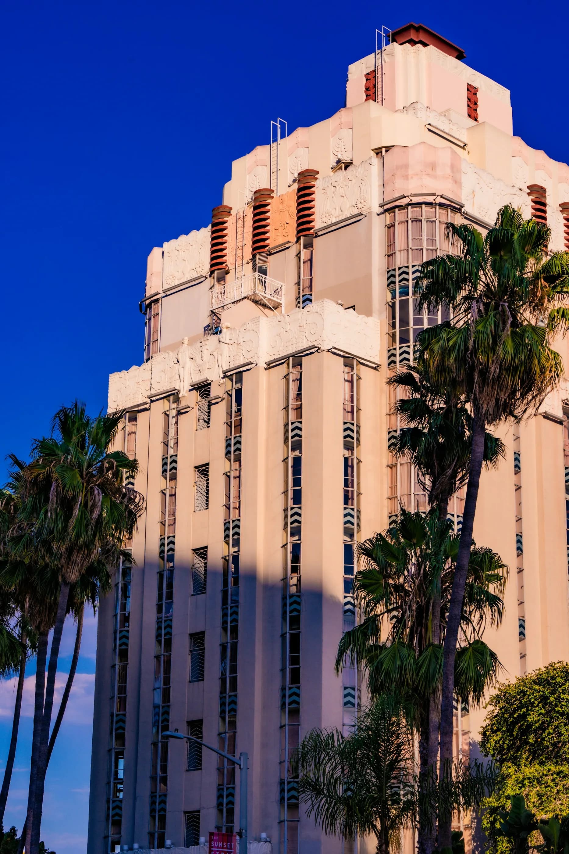 Palm trees beside the Art Deco Sunset Tower Hotel on West Hollywood’s Sunset Strip.